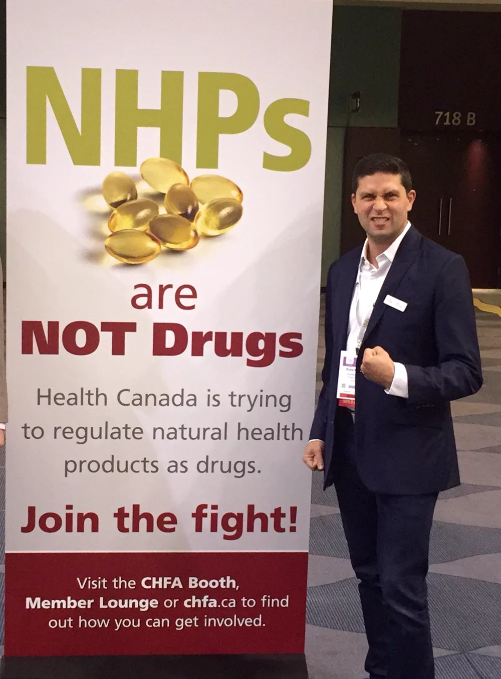 Robert Assaf beside a CHFA campaign banner reading 'NHPs are NOT Drugs — join the fight'